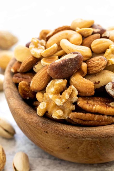 Nuts qualify as healthy snack material, so long as they are raw and not covered in salt, then you can eat them almost daily. #nuts #healthbenefits #healthysnacks Tree Nut Allergy, Raw Nuts, Healthy Nuts, Peanut Allergy, Probiotic Foods, Roasted Nuts, Banana Nut Bread, Banana Nut, Mixed Nuts