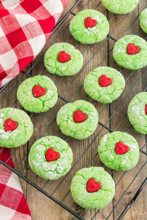 grinch cake mix cookies on top of drying rack Grinch Cake Cookies, Grinch Crinkle Cookies Cake Mixes, Grinch Mint Cookies, Grinch Cake Mix Cookies, Cute Holiday Treats, Chewy Christmas Cookies, Grinch Recipes, Grinch Cookie, 2023 Cookies