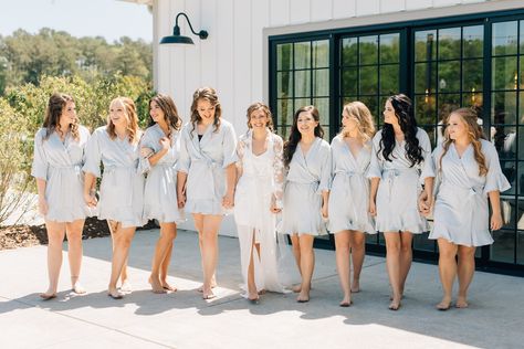 "As your wedding day approaches, you crave picture-perfect moments at every turn. Our ruffle bridesmaids robe are comfortable, fashion-forward robes that crafted with high-quality satin, offering a range of sizes and a spectrum color options. Personalize with a monogram for that final touch. Gift your bridesmaids our flounce ruffle robes, made of chiffon satin with a luxe matte finish. Featuring internal and external ties, these knee-length robes are a perfect surprise for the bridal party. Complete your wedding day with our kimono-style robes, easy to mix-and-match to create your unique bridal party look. Whether it's the maid of honor, mother of the bride, or bridesmaids, our white robe with delicate ruffles in sage green, emerald green, blush pink, or dusty rose will make them feel spec Bridal Party Robe Pictures, Bridesmaids Robes Pictures, Gifts For Bridal Party, Robes Bridesmaids, Bridesmaids Robe, Bridesmaid Gifts From Bride, White Bridal Robe, Touch Gift, Wedding Party Robes