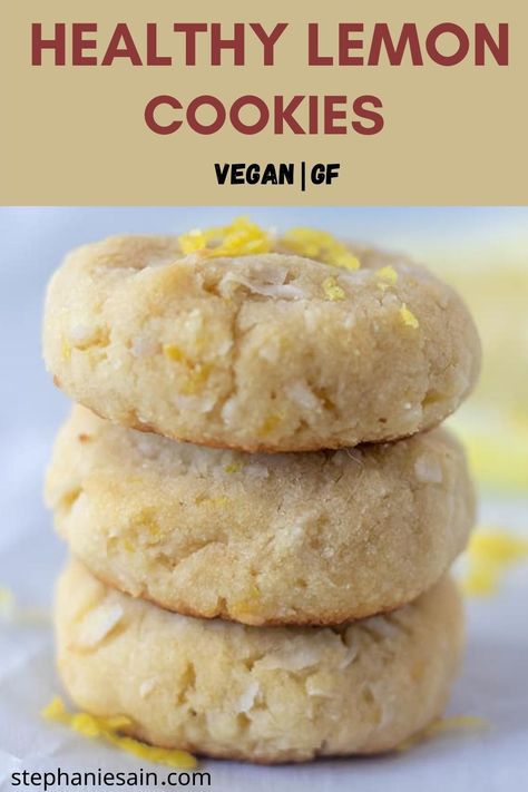 lemon cookies stacked on a parchment lined pan garnished with fresh lemon zest. Soft Lemon Cookies, Chewy Lemon Cookies, Cookies Sans Gluten, Galletas Keto, Lemon Cookies Recipes, Cookies Gluten Free, Vegan Cookies Recipes, Chewy Cookies, Desserts Vegan