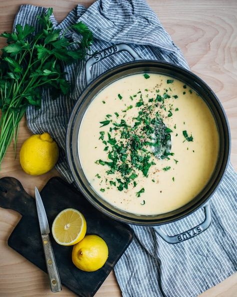 Cold weather conjures memories of my mom's creamy potato soup, with its tiny pools of melted butter and black pepper flecks on the surface. It was rich and sating, but also simple and balanced. That simplicity and balance was front and center as I invented my own take on my mom's recipe. A cache of lemons on my countertop presented the chance to push the envelope. I wanted a soup that was creamy, sure, but also tangy and vivid. My potato soup is every bit as comforting as the recipe I... Potato Chowder Recipes, Spring Potato, Spring Side Dishes, Slow Cooker Potatoes, Potato Chowder, Mediterranean Summer, Lemon Potatoes, Creamy Potato Soup, Potato Leek Soup