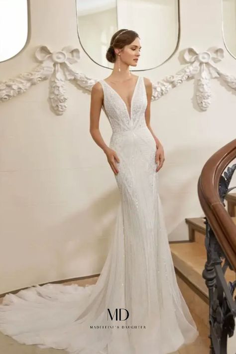 The fitted wedding dress Quiric by Rosa Clara has a plunging neckline sovered in rhinestones and beads. Wedding Dress Sophisticated, Sophisticated Wedding Dress, Rosa Clara Bridal, Wedding Dress Fitted, Glamorous Wedding Dress, Glam Bride, Portsmouth Nh, Bride Groom Dress, Wedding Dresses Beaded