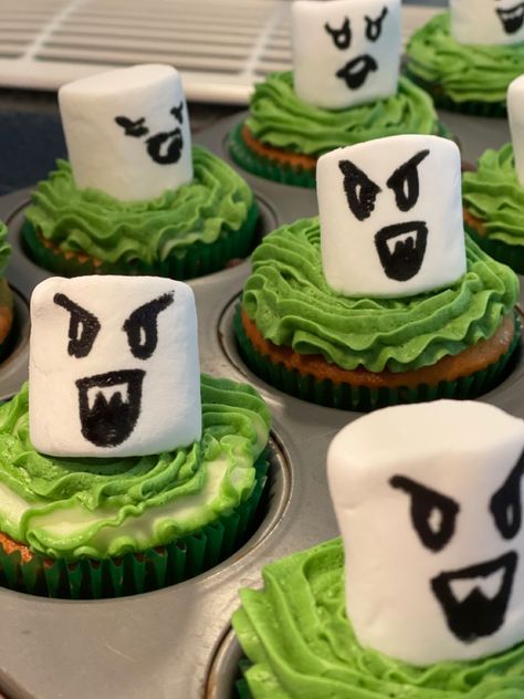 Luigis Mansion Cupcakes with green Jello pokes Luigi Mansion Party Decorations, Luigi’s Mansion Birthday Party, Luigi Mansion Cake, Luigis Mansion 3 Party, Luigi Mansion Party Ideas, Mario Kart Party Ideas, Luigis Mansion Birthday, Luigis Mansion Birthday Party, Mansion Decoration