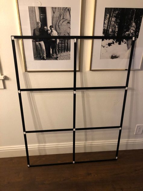 Diy Black Framed Windows, How To Frame In A Window, Diy Industrial Window, Black Windows Diy, Window Pane Mirror Living Room, Diy Black Grid Window, Spray Painting Window Frames, Painting Metal Window Frames Black, Diy Window Panels Frame