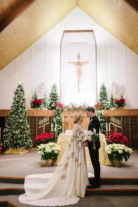 Winter Wedding Ceremony Filled With Christmas Trees and Poinsettias Winter Ceremony Decor, Christmas Decor Church, Wedding Theme Winter, Church Wedding Decor, Wedding Ideas Red, Venue Decor Ideas, Winter Wonderland Wedding Theme, Cassie Wedding, Christmas Wedding Decor