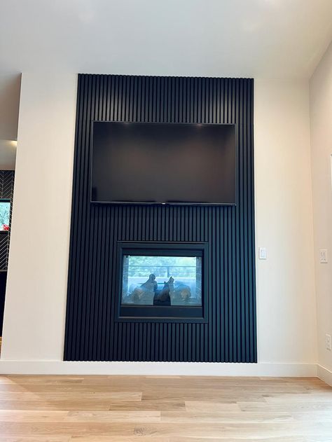 Acoustic Slat Wall, Wood Interior Walls, Slat Wall Panel, Wood Wall Paneling, Tv Unit Interior Design, Fireplace Tv Wall, Black Fireplace, Wood Wall Panels, Wood Slat Wall