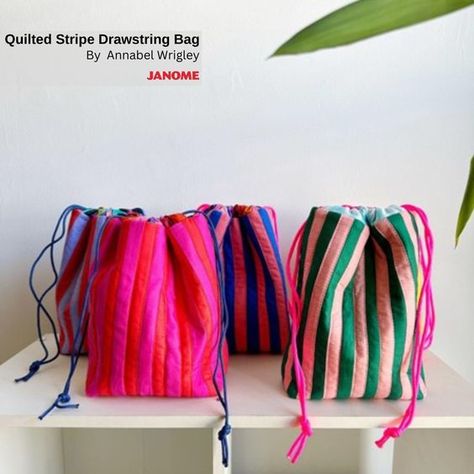 These sweet stripe quilted bags by #janomemaker @littlepincushionstudio are the perfect quick sewing project and make the most perfect gift for anyone! Store your sewing notions when traveling or make it with vinyl lining for the sweetest makeup bag! Tap the link in bio for the full tutorial! #janome #janomeamerica #janomemakes #quilting #sewing #sewists #quilters #makers #newproject #sewingproject #quilt #sew #sewistsofinstagram #makersgonnamake #sewingdiy #quiltingproject Colorful Sewing Projects, Quilted Drawstring Bag Tutorial, Sewing Gift Bags Patterns, Diy Scrap Fabric Ideas, Sewing Projects Makeup Bag, Quilted Drawstring Bag, Sew Project Bag, Holiday Sewing Projects Diy Gifts, Sewing Bag Tutorial