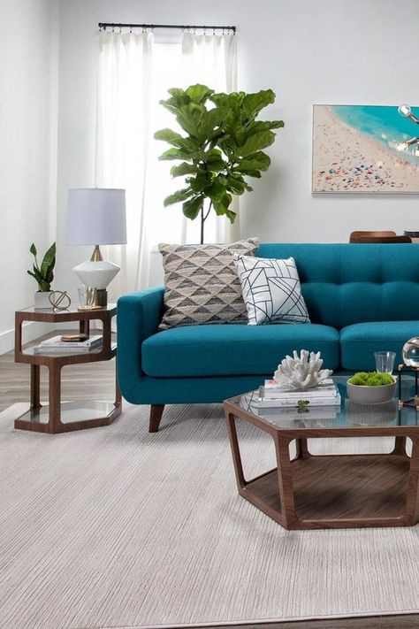 Teal Couch Living Room, Contemporary Coastal Living Room, Teal Sofa Living Room, Texas Apartment, Blue Sofa Living, Sustainable Living Room, Modern Coastal Living Room, Contemporary Family Room, Teal Sofa