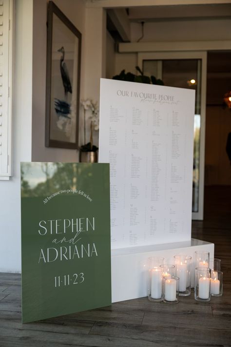 Love the use of the 2 tones and colours for the welcome sign and seating chart! Photography: 📸Icon Photography Framed Seating Chart, Oil Painting Seating Chart, Wedding Seating Chart Champagne, Seating Chart Wedding Poster, Photo Frame Wedding Seating Plan, Dark Seating Chart Sign, Icon Photography, Reception Signage, People Fall In Love