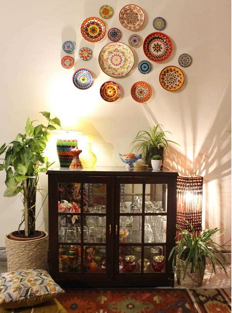 Choosing the right colours for your wall plate grouping is an art! 📷 Jumpi Chakravarty @jumpichak DecorDrama is a Facebook community group for decor enthusiasts. This image is curated from our Facebook decor community. Kindly do not share or repost this image without prior permission. #antiquecupboard #antiquedisplaycabinet #gallerywall #greenplants #handpaintedplate #hangingplate #indianhomedecor #indoorplantsdecor #livingwithplants #platedesign #platewall #vintagehomedecor #walldecor Mexican Plate Wall Decor, Plate On Wall, Mexican Plates, Antique Display Cabinets, Mexican Wall Art, Mexican Wall, Antique Cupboard, Plate Wall Decor, Plate Wall