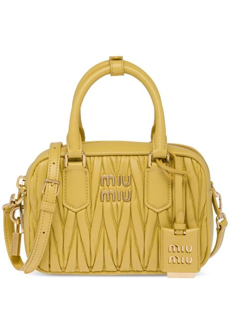 Shop or share your style of the product on ModeSens! logo-plaque matelassé leather mini bag from MIU MIU featuring yellow, nappa leather, matelassé effect, logo plaque, logo tag, gold-tone hardware, adjustable detachable shoulder strap, two top handles, top zip fastening, main compartment, internal slip pocket and internal logo plaque. Miu Miu Handbags, Leather Mini Bag, Miu Miu Bag, Yellow Handbag, Bag Obsession, Quilted Totes, Bags Logo, Mini Shoulder Bag, Dolce & Gabbana