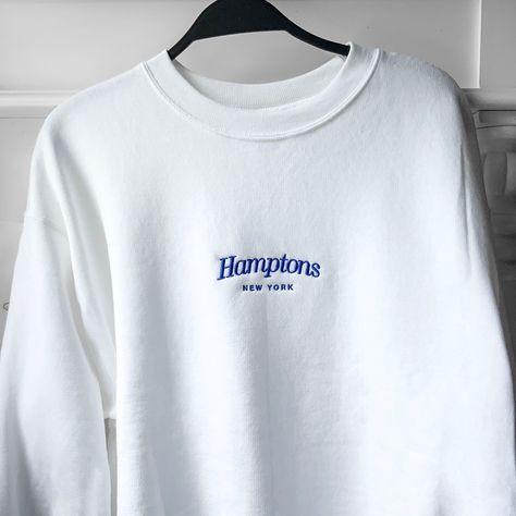 "\"Hamptons New York\" embroidered on a comfy vintage-style crewneck. If you're on the lookout for both style and comfort, this fleece sweatshirt is the perfect choice. And with up to 5% recycled polyester in components, you'll be taking a little step closer to a more earth-friendly way of life. *Sizes Are Unisex * 50% cotton, 50% polyester (up to 5% recycled polyester, made from plastic bottles) * Fabric weight: 7.8 oz/y² (264.5 g/m²) * Patented low-pill, high-stitch density PrintPro® XP fleece Vintage Crewneck Outfit, Etsy Sweatshirts, Sweatshirt Design Ideas, New York Sweater, Hamptons New York, Merchandise Ideas, Autumn Tops, Navy Blue Crewneck, Merch Ideas