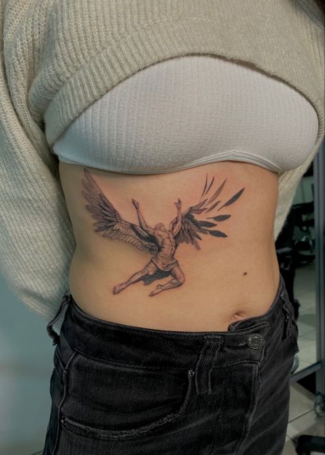 Fresh fine line Icarus rib tattoo Angel Tattoo Rib Cage, Fine Line Stomach Tattoo, Icarus Rib Tattoo, Fine Line Tattoo Rib Cage, Angel On Ribs Tattoo, Men Rib Cage Tattoo, Bird On Ribs Tattoo, Rib Cage Tattoo, Rib Cage Tattoos