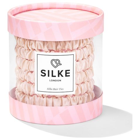 Treat your hair to the snag-free benefits of SILKE London Coco Hair Ties, a pack of 100% pure silk bobbles that are gentle on hair to eliminate snapping, kinks and damage.    Handcrafted from 100% pure mulberry silk with a specially selected, super-strength elastic interior, the champagne silk hair ties glide over hair to prevent snagging and tugging, and provide super strong hold with causing damage, split ends or unsightly kinks.  -  good, want!     lj Cleopatra Hair, Silk Hair Ties, Coco Hair, Champagne Tie, London Hair, Ballet Bun, Hair Brands, Silk Hair, Hair Elastics