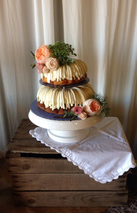 Nothing Bundt Cakes (Tualatin location) tiered cake with drizzle frosting and real floral- arranged by Bella Floral of Portland, OR. Photo taken at Langdon Farms Drizzle Frosting, Bundt Wedding Cake, Nothing Bundt Cakes Wedding, Bundt Cakes Wedding, Red Birthday Cake, Red Birthday Cakes, Whiskey Cake, Nothing Bundt, Nothing Bundt Cakes