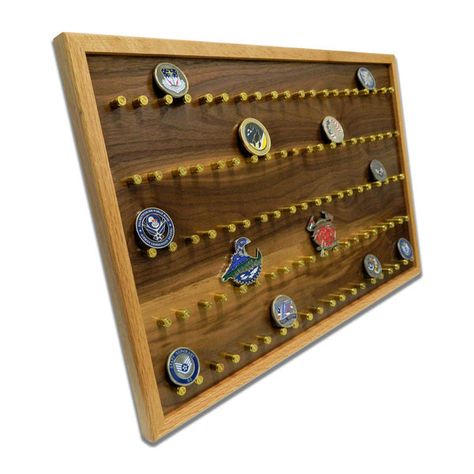 🇺🇸 Proudly present your challenge coins with our Original 9mm Brass Casing Challenge Coin Display. At Legacies of America Woodworking Co, our commitment to being American Made - Veteran Built™ shines through in every piece we create. Handcrafted by U.S. military veterans, this display combines quality craftsmanship with a unique design to showcase your prized collection. The Original 9mm Brass Casing Challenge Coin Display features: • Distinctive Design: Incorporates authentic 9mm brass cas... Coin Holder Military, 50 Challenge, Retirement Plaques, Patches Display, 9mm Bullet, Military Coins, Challenge Coin Display, Cardboard Display, Bullet Casing