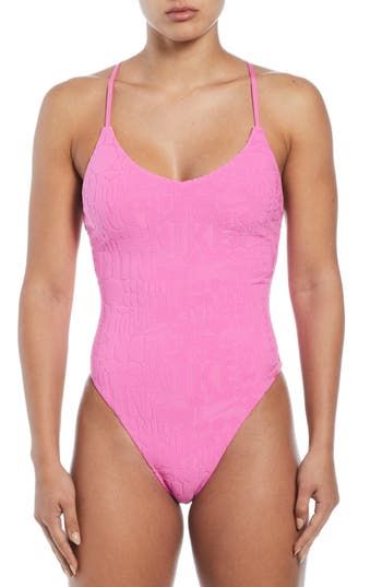 The flattering shape of this one-piece starts with a scoop neckline that gives way to an elongating T-strap design along the open back. T-strap back Full back coverage Lined 93% recycled polyester, 7% spandex Hand wash, line dry Imported Nike Retro, Strap Design, T Strap, Womens Swimwear, Scoop Neckline, One Piece Swimsuit, Open Back, Hand Wash, Nordstrom