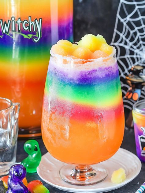 Witches Brew Punch 🍹   🍹 𝗜𝗻𝗴𝗿𝗲𝗱𝗶𝗲𝗻𝘁𝘀 🍹 2 liters lemon-lime soda (such as Sprite or 7-Up) 1 liter pineapple juice 1 liter orange juice 1 tub (1.5 quarts) rainbow sherbet Optional: gummy worms or spooky candy for garnish 🍹 𝗜𝗻𝘀𝘁𝗿𝘂𝗰𝘁𝗶𝗼𝗻𝘀 🍹 Mix the Base: In a large punch bowl, combine the lemon-lime soda, pineapple juice, and orange juice. Stir gently to combine all the liquids. Witches Brew Punch, Rainbow Stuff, Spooky Candy, Rainbow Sherbet, 7 Up, Lemon Lime Soda, Gummy Worms, Lime Soda, Witches Brew