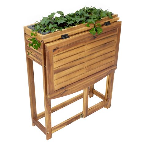 Make sure gardening tools and gloves are at hand while tending plants with this unique raised herb planter box with a folding table. This small raised garden bed with legs can be used to plant a variety of plants and flowers. The added height also makes it easy to garden without needing to squat or stoop. This stylish herb garden table planter is made of durable acacia wood for lasting strength and beauty season after season. Plus, this garden bed includes a removable insert that is made from polypropylene and features 3 holes for proper drainage. This unique bed features a convenient folding tabletop. Simply lift the tabletop and swing the leg over to set up the tabletop and easily fold down the tabletop to save space when not in use. The tabletop provides a convenient surface for a flowe Small Raised Garden, Cali Apartment, Herb Planter Box, Raised Flower Bed, Rectangular Planter Box, Wood Raised Garden Bed, Planter Liners, Wood Folding Table, Elevated Planter Box