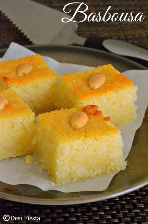 Eggless Basbousa with Coconut Recipe | Egyptian Basbousa|Eggless Semolina/ Rava cake |Arabian Dessert - Desi Fiesta Egyptian Dessert Recipes, Arabian Dessert, Basbousa Recipe, Rava Cake, Semolina Cake Recipe, Egyptian Desserts, Fake Ginger, Arabic Sweets Recipes, Coconut Recipe