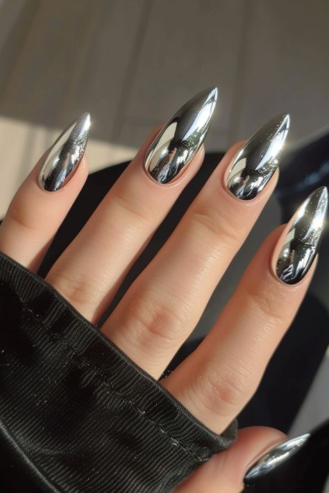 Get ready to dazzle and shine with the hottest nail trend of the season: chrome nails! This mesmerizing look is guaranteed to elevate your style and turn heads wherever you go. So, if you’re looking Nail Shine Design, Silver Chrome Stiletto Nails, Short Metallic Nails, Nail Designs Gray, Long Chrome Nails, Metallic Chrome Nails, Chrome Stiletto Nails, Mirror Chrome Nails, Chrome Nail Designs