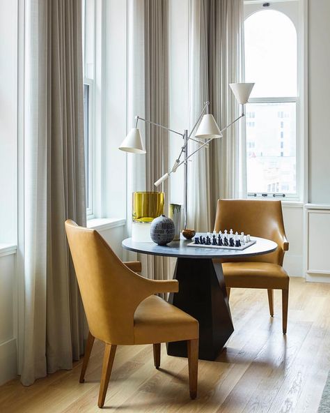 @dumais_inc has inspired us to learn chess after putting together this seating area inside a TriBeCa apartment. We love the use of the… Game Table And Chairs, Tribeca Apartment, Modern Game Tables, Egg Collective, Brick Room, Learn Chess, Chess Table, Dining Room Colors, Paint Colors For Living Room