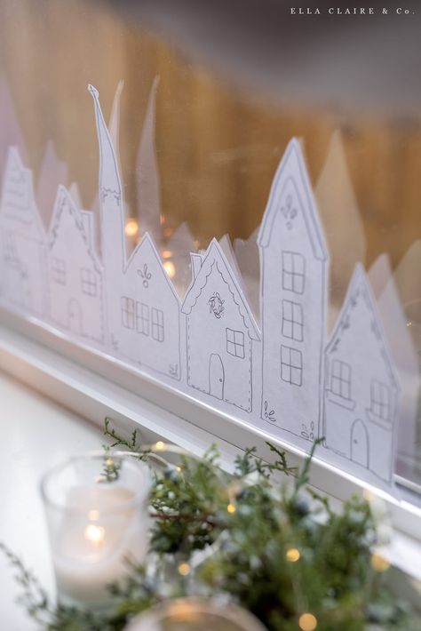 Adorable Christmas Houses as a window village- easy to print and add charm to your windows this holiday season. This free decor is classy and simple but such a fun accent in any room! Christmas House Window Display, Free Christmas Village Printables, Christmas Village Window Stencil, Free Printable Christmas Village Window Stencil, Christmas Window Drawing Template, Diy Christmas Window Decor, Christmas Window Stencils Free Printable, Christmas Window Template Free Printable, Christmas Decor Ideas Window