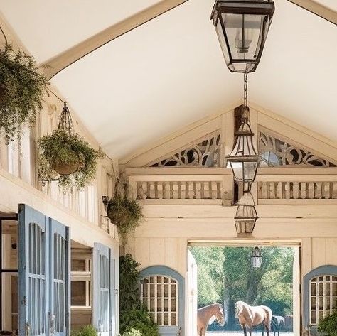 𝑨𝒏𝒅𝒓𝒆𝒂 𝑲𝒏𝒐𝒘𝒍𝒆𝒔 on Instagram: "French Provencal Stable (&Interior) Design | We got some great results within the barn(s) today - love to hear which is your favorite horse stall in the comments. When I got my first pony at 7 years old my poor parents who are NOT horse people were lucky enough to have a friend who was. SO, pony and I went to her house, him to live, me to learn to ride. My parents' friend had a lovely blue and white 6-8 stall with pastures and a nice sized arena. The ba French Horse Stables, Stable Interior, Fearless Aesthetic, Dream Stables, Horse Stall, Horse Stalls, Horse Stables, Horse Barn, French Countryside