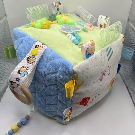 @little.bunny._.shop shared a photo on Instagram: “Custom green and blue custom sensory cube! Featuring a paci clip, sensory charm side, and a silicone bead string! Tags------…” • May 9, 2021 at 9:18pm UTC Sensory Cube, Victorian Boy, Puppy Time, Trans Boys, Paci Clip, Baby Sensory Toys, Teether Toys, Inner Child Healing, Baby Sensory