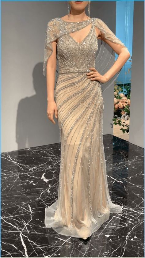 #PronDress#Outfit#Fashionista#FashionForward#TrendingNow Baju Pengapit, Silver Evening Gowns, Kain Tile, Mothers Gowns, Beaded Evening Gowns, Mother Of The Bride Dresses Long, Silver Gown, Sequin Evening Gowns, Drape Gowns