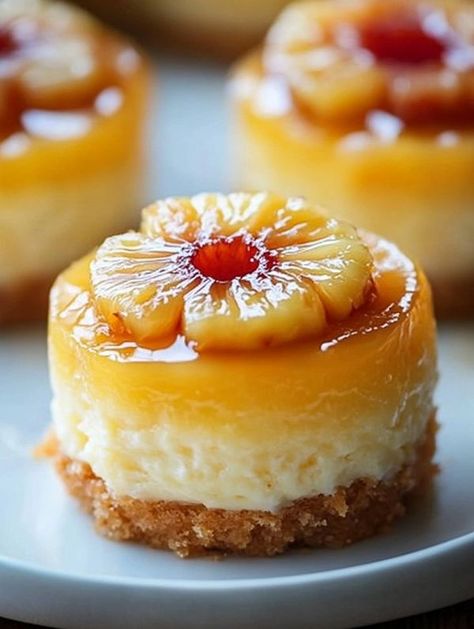 🧑‍🍳 Hommey Dishes 🥘🍳 | These Mini Pineapple Upside Down Cheesecakes are as delicious as they are cute | Facebook Pineapple Upside Down Cheesecake Cake, Cheesecake Recipes Mini, Cute Cheesecake, Pineapple Upside Down Bundt Cake Recipe, Pineapple Upside Down Cheesecake, Pineapple Dessert Easy, Upside Down Cheesecake, Mini Pineapple Upside Down Cakes, Pineapple Cheesecake