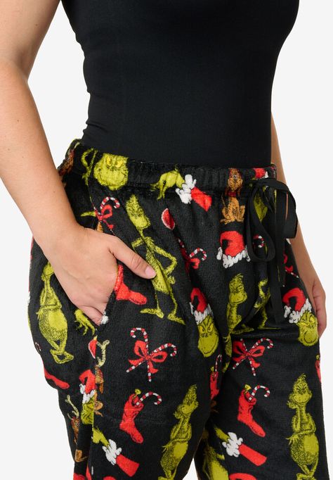 The Grinch and his trusty friend Max love having fun lounging around.FABRIC: PolyesterPants features an all-over print of The Grinch, Max, and Christmas decorations.Relaxed fit, soft and comfy elastic waist with Drawstring Tie.100% Polyester. Soft Plush fabric.Women's Plus sizing. Pants measures approximately (laid flat):Waist: 1X =19", 2X = 20", 3X = 21", 4X = 24", 5X = 26".Inseam: 1X = 29 1/2", 2X = 29 1/2", 3X = 29 1/2", 4X = 29 1/2", 5X = 29 1/2".Length (from waist): 1X = 40", 2X = 41", 3X = 42", 4X = 43", 5X = 44". available in sizes 1X,2X,3X,4X,5X Christmas Pijama Pants, Grinch Pants Pjs, Fuzzy Grinch Pants, Grinch Pj Pants, Grinch Chrismas Pajamas, Grinch Mens Pajama Pants, Grinch Pajamas, Plush Pajama Pants, Max Love