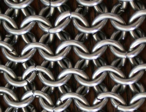 Chainmail (aka: chainmaille, chain mail, chain maille, maille or mail) is made… Make Chainmail, Chainmail Glove, Armour Tattoo, Shoulder Armor Tattoo, Chainmail Armor, Viking Cosplay, Viking Armor, Armband Tattoos, Armor Tattoo