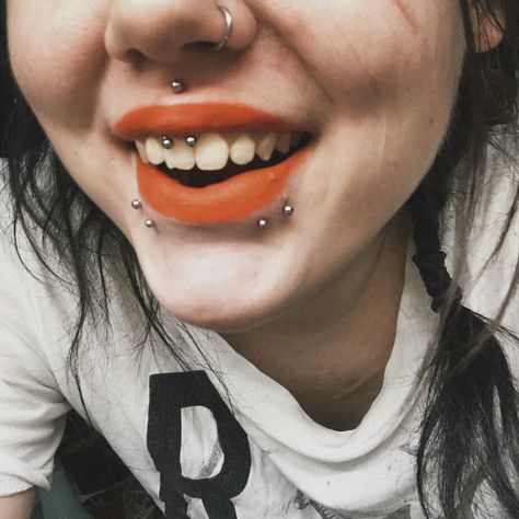 #piercings #sharkbites #lipstick #orange #smileypiercing #medusa #lippiercing #nosepiercing #nosering #multiplepiercings Medusa And Smiley Piercing, Lip Piercing Stud, Lip Piercing Labret, Lip Piercing Ring, Stab People, Piercings Ideas, Lip Piercings, Smiley Piercing, Medusa Piercing