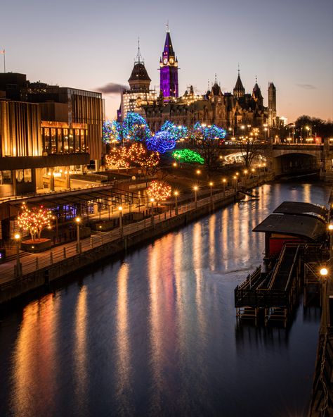 Christmas lights in Ottawa in the Rideau Canal reflection Rideau Canal Ottawa, Painting Concepts, Harry Potter Castle, Iceland Ring Road, Budget Friendly Travel, Germany Castles, Christmas Painting, Weekend Travel, World Cities