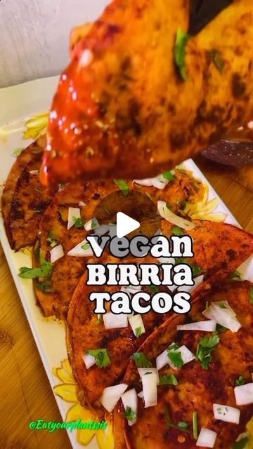 ShA on Instagram: "Vegan Birria Tacos 
Ingredients

- 1 whole onion
- 1/2 chopped onion (for corn tortillas)
- Fresh cilantro
- King oyster mushrooms
- Better than bouillon, veggie base
- 6-8 garlic cloves
- 7 Guajillo Chile pods
- 3 Pasilla Chile pods
- Corn tortillas
- 1-2 tsp Maggi liquid jugo
- Vegan cheese

Directions:

1. Deseed and rehydrate Guajillo and Pasilla Chile pods with a whole onion in boiling water for 10-15 minutes.
2. Blend boiled mix with garlic cloves.
3. Shred king oyster mushrooms, sauté with parsley and cayenne pepper.
4. Strain birria mix onto shredded mushrooms, simmer for 10 minutes, and add Maggi liquid jugo.
5. Dip corn tortillas in the mix, fill with meat mixture, vegan cheese, onions, and cilantro.
6. Cook each side for 1-2 minutes, add extra sauce for flavor Taco Ingredients, Vegan Tacos, Corn Tortillas, American Food, Cayenne Peppers, Vegan Cheese, Fresh Cilantro, Vegan Foods, Cilantro