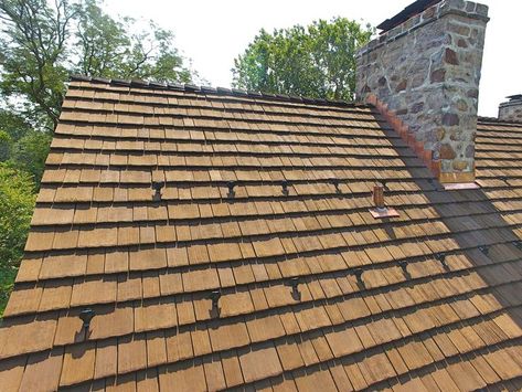 A cedar roof is a great way to create a rustic look for your home. However, when it comes to installing cedar roof shingles, it’s no easy task. If you do not install your cedar shake roof the right way, it can seriously affect its longevity. While it is best to hire a professional to handle the installation for you, a cedar shake roof installation do-it- yourself job is not impossible. Cedar Roof Shingles, Shake Roofing, Homeowner Tips, Roof Cap, Cedar Shake Roof, Cedar Shingle Roof, Shake Shingle, Cedar Shake, Shake Roof