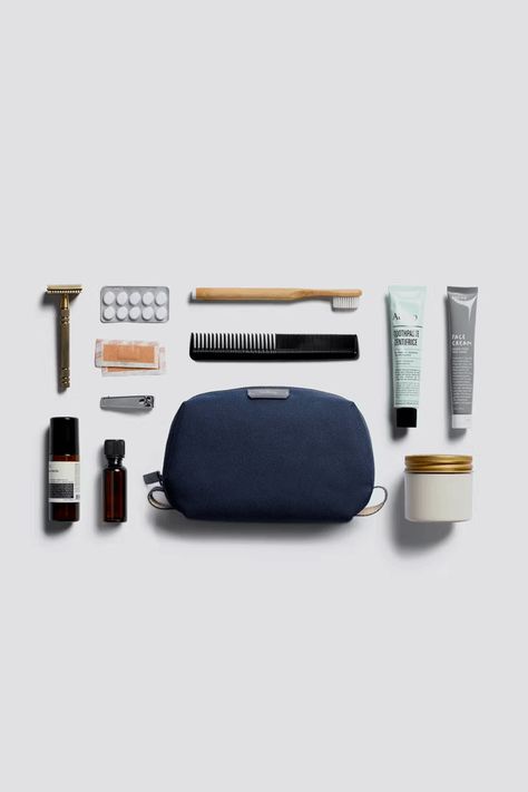 Bellroy Toiletry Kit - Navy Groomed for everyday travel, the Toiletry Kit sorts your toiletries into a neat package that slides into your bag. Measurements: 230 x 135 x 80mm Material: Water-resistant woven fabric, made from recycled plastic bottles Features:- Water-resistant lining for easy wipe down- Toothbrush sleeve with magnetic closure- Internal mesh pockets to organize your things- Nylon grab loops for easy carrying- Flexible structure makes it easy to pack in your bag- Water-resistant wov Navy Groom, Hasami Porcelain, The Body Book, Toiletry Kit, Wallet Gifts, Japan Design, Blue Blanket, Bag Measurements, Blue Pillows