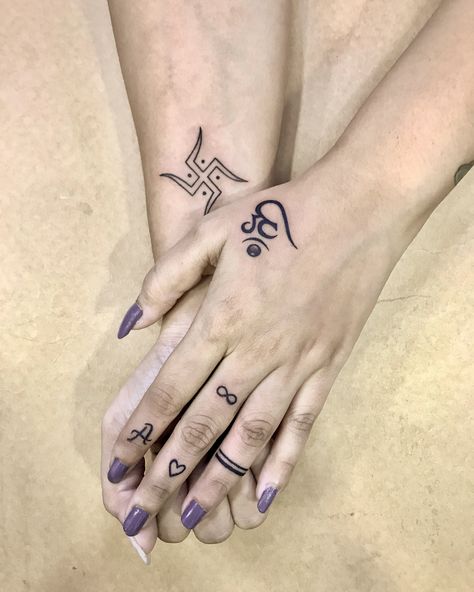 Navratri Tattoo Design, Wander Tattoo, Wrist Hand Tattoo, Simple Hand Tattoos, Trishul Tattoo Designs, Mahadev Tattoo, Small Neck Tattoos, Om Tattoo Design, Chakra Tattoo