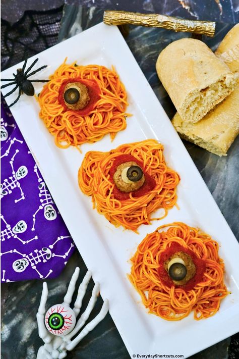 Eyeball Spaghetti - Everyday Shortcuts Halloween Party Punch Recipes, Spaghetti Cheese, Frozen Italian Meatballs, Halloween Party Punch, Halloween Pasta, Red Pasta, Spaghetti Ingredients, Cheese Stuffed Meatballs, Party Punch Recipes