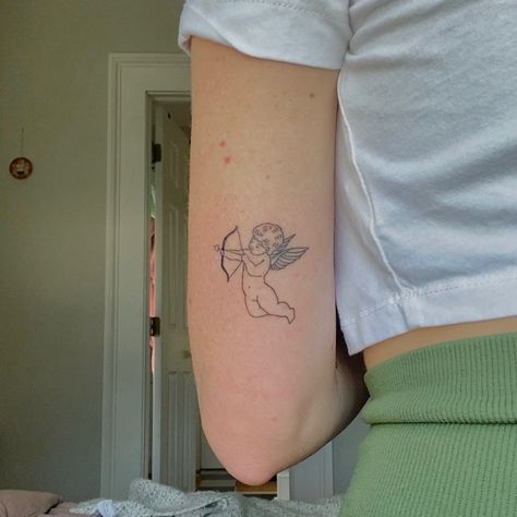 Cherub Tattoo Placement, Angel Bow And Arrow Tattoo, Cupid Tattoo Ideas, Fine Line Cherub Tattoo, Cherub Angel Tattoo Simple, Cupids Bow Tattoo, Cherub Angel Tattoo, Cherub Tattoo Designs, Archer Tattoo