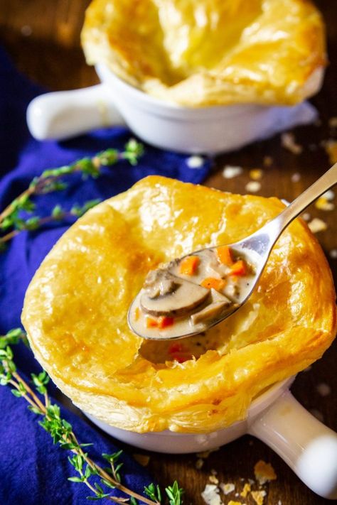 a close up image of mushroom soup in an oven safe bowl with a baked puff pastry crust on top and fresh thyme in the background Zuppa Soup Pastry, Zuppa Soup, Homemade Tomato Soup, Mushroom Soup Recipe, Puff Pastry Crust, Tomato Soup Homemade, Mushroom Soup Recipes, Cream Of Mushroom Soup, Cream Of Mushroom