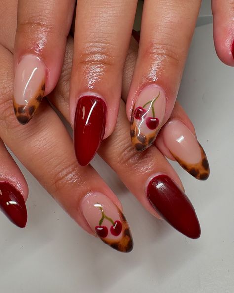 the cutest combo 🧸 this is your sign to book your fall set❣️ #gelx #fallnails #fallnailinspo #nailart #nailartist #rednails #tortoisenails #cherrynails Cherry Fall Nails, Cherry Cheetah Nails, Cheetah Cherry Nails, Fall Flower Nail Designs, Apple Nails, Mail Inspo, Fruit Nails, Bday Nails, Cheetah Nails