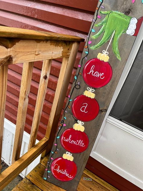 Easy & Affordable Dollar Store Christmas Crafts for a Festive Home Seasonal Wood Decor, Front Porch Signs Wooden Diy Christmas, Grinch Porch Leaner, Porch Boards Signs, Porch Leaner Sign Diy, Christmas Porch Leaners, Diy Outdoor Christmas Decorations Yard, Diy Grinch Christmas Decorations, Noel Christmas Sign