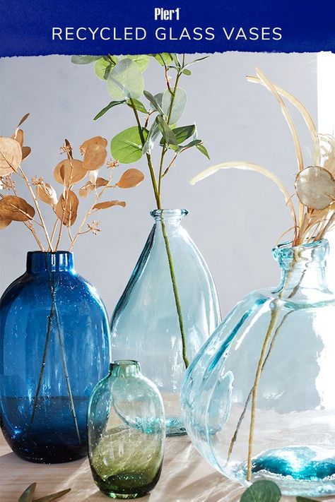 Our recycled glass vases are hand-blown in organic shapes and fresh, earthy hues. Available in a variety of sizes, they work well as a stand-alone accent or a beautiful vase centerpiece. #homedecor #pier1love Recycled Glass Vases, Vase Centerpiece, Sunroom Decorating, Earthy Hues, Beach Stuff, Decor Elements, Home Planner, Cork Crafts, Diy Wine