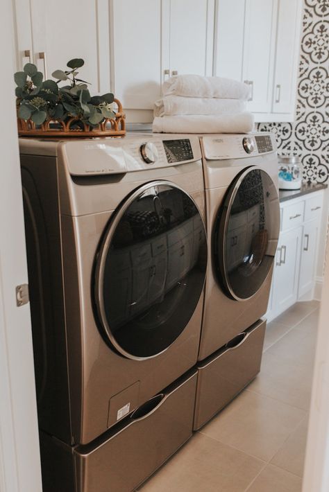 Laundry Room With Champagne Washer, Laundry Room Champagne Washer And Dryer, Satin Nickel Washer And Dryer Laundry Room, Champagne Washer Dryer Laundry Room, Rose Gold Washer And Dryer Laundry Room, Grey Washer Dryer Laundry Room, Small Laundry Room Ideas With Front Loaders On Pedestals, Front Loader With Pedestal Laundry Room Ideas, Laundry Room Design Front Loaders On Pedestals