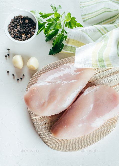 Raw chicken breast fillets on wooden board on table background by Anikona. Raw chicken breast fillets on wooden board on table background. #Sponsored #breast, #fillets, #Raw, #chicken Raw Chicken Breast, Table Background, Chicken Breast Fillet, Raw Chicken, Wooden Board, Chicken Breast, Steak, Nutrition, Diet