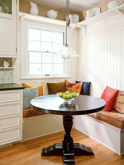 Space-Smart Banquette.  SO PRETTY!  "Banquettes can lend storage space for kitchens with limited cabinet space. The top of this L-shape bench lifts to reveal storage for rarely-used kitchen equipment. An open round tabletop provides plenty of space for casual family dinners and more." Seating In Kitchen, Banquette Ideas, Window Seat Kitchen, Banquette Seating In Kitchen, Kitchen Breakfast Nooks, Corner Seating, Corner Kitchen Cabinet, Kitchen Banquette, Kitchen Seating