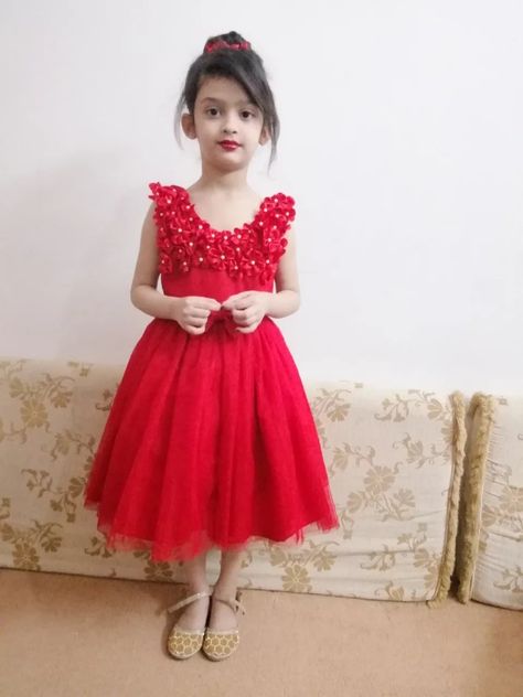 a very beautiful net frock for 5year girl in red colour. i used fabric flowers to decorate the bodice. Frock For Kids, Net Frock, Ruffled Baby Dress, Frock Designs For Girl, Red Frock, Frock Models, Kids Frock, Frocks For Kids, Kids Party Wear Dresses