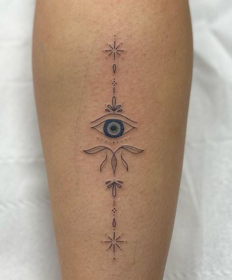 18 Unique Evil Eye Tattoo Designs for Charm and Positivity Evil Eye Tattoo On Back, Protection From Evil Eye Tattoo, Unalome Evil Eye Tattoo, Small Greek Tattoos With Meaning, Evil Eye Back Tattoo Women, Evil Eye Forearm Tattoo, Sun Evil Eye Tattoo, Eyes Tattoo Ideas Women, Evil Eye Shoulder Tattoo